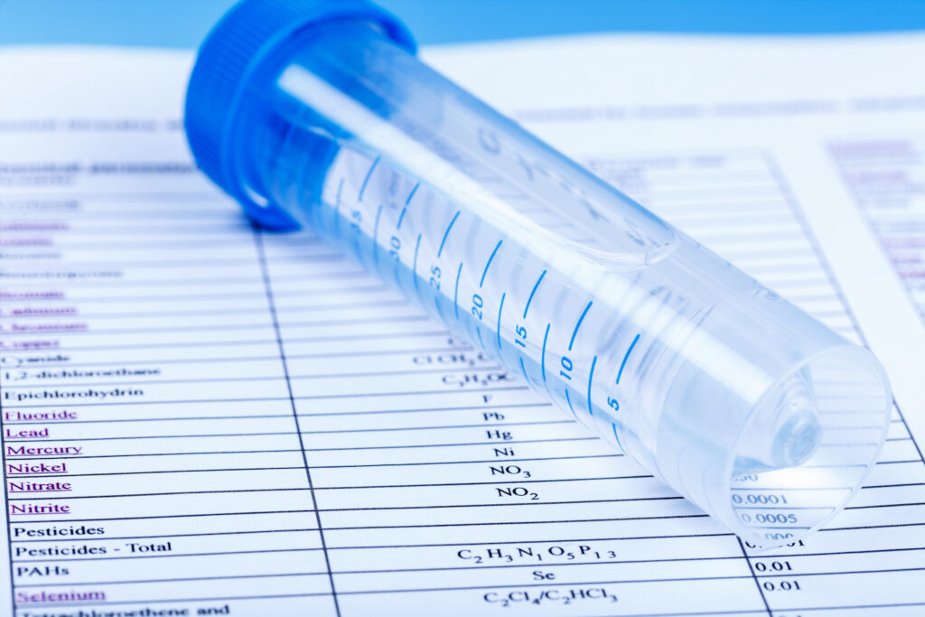 Water quality test sample tube and lab report - Yankee Home Inspections Bangor Maine